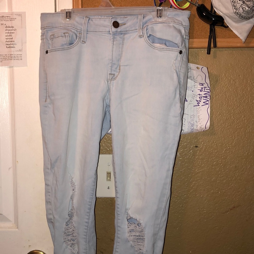 Light blue ripped mid-rise jeans